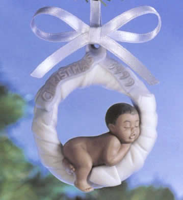 Baby's First Christmas 1999 Lladro Figurine