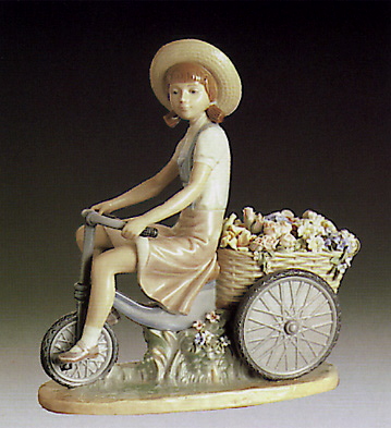 Girl W-flowers In Tow Lladro Figurine